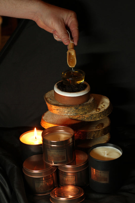 A collection of Irish Soy Wax Candles with honey and tobacco leaf